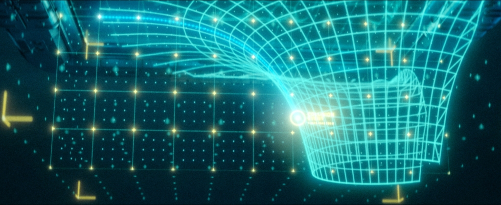 Ryan Wieber created the hologram using Adobe After Effects, combining motion graphics with CG set elements in order to integrate the display into the live-action plates. Hologram close-ups were fully digital.